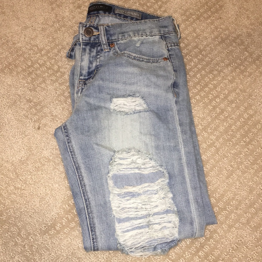 Distressed denim jeans